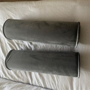 Set Of Gray Tubular Throw Pillows